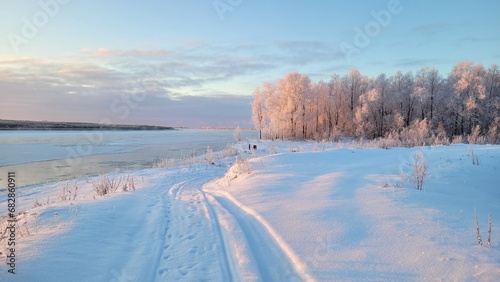 Winter landscape with road and frozen trees