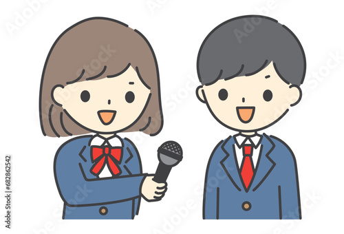 学校で男子学生にインタビューをする女子学生