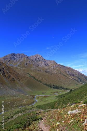 Ninth stage of Ak-Suu Traverse trek from Karakol Gorge to Jeti Oguz in Karakol national park, Kyrgyzstan