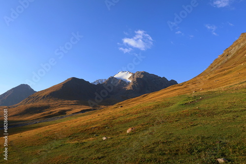 Landscape of Tian Shan Mountains next to Kol Ukok lake in Naryn region, Kyrgyzstan