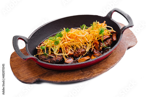 steak with mushrooms and onion chips photo