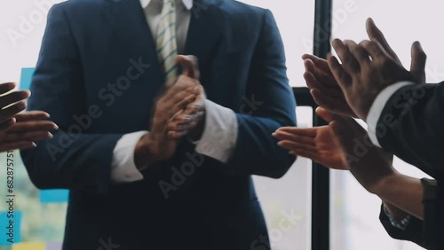 Photo of partners clapping hands after business seminar. Professional education, work meeting, presentation or coaching concept.Horizontal,blurred background photo