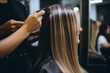 Professional Hairdresser Styling Blonde Hair in Salon