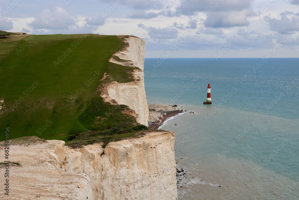 Seven Sisters. The South Downs National Park. White chalk cliffs, view of the Beachy Head Lighthouse, Eastbourne, East Sussex, England.