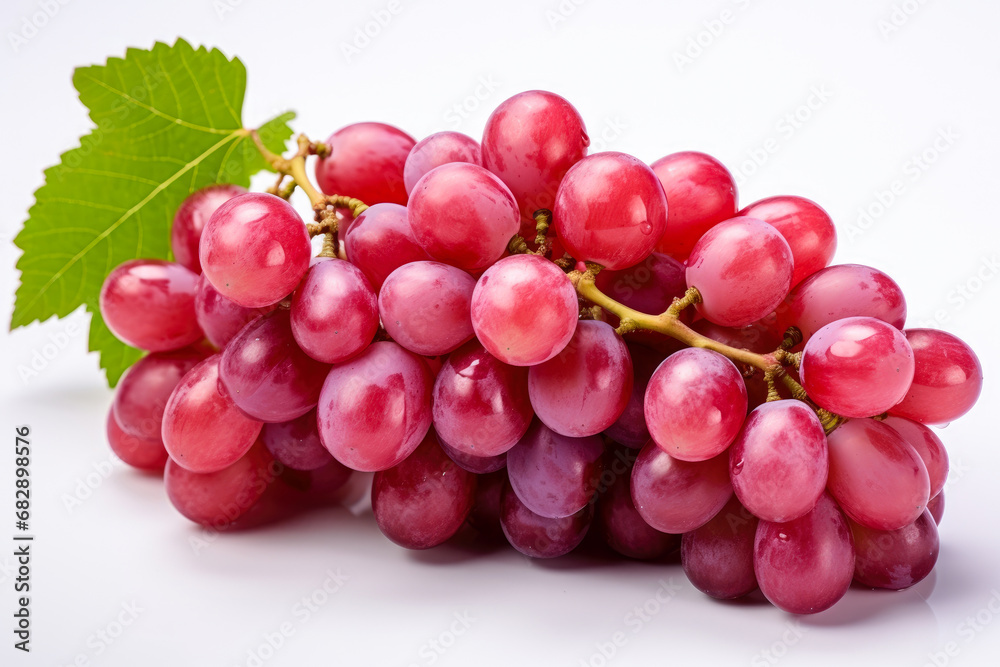 Ripe red grape. Pink bunch with leaves isolated on white. With clipping path. Full depth of field.. Ripe red grape. Pink bunch with leaves isolated on white. With clipping path. Full depth of field..