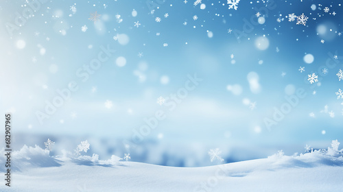 Winter snow background with beautiful light and snow flakes on the blue sky © KJ Photo studio