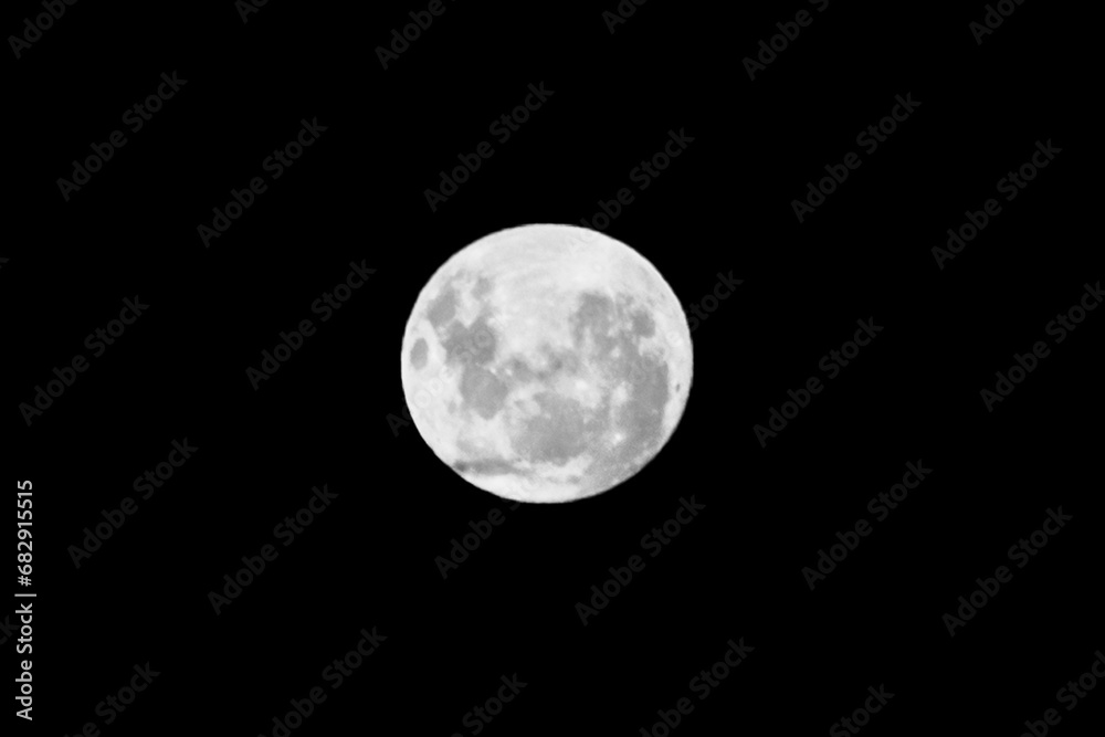 White moon nature light object in the night sky, close-up White moon nature light object in the night sky, close-up