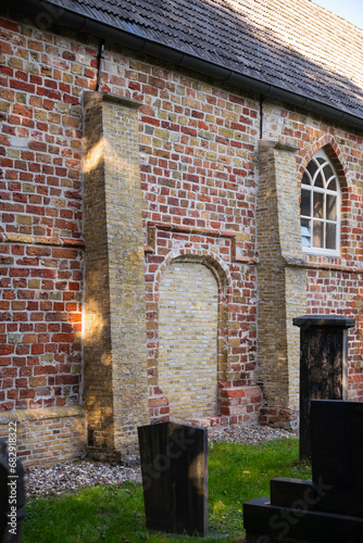 old Entrance for men to the Reformed church in Duurswoude, Netherlands photo