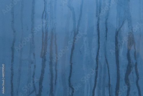 Fototapeta Naklejka Na Ścianę i Meble -  Blue streaks paint spilled surface ceramic tiles wall dirty old texture background, close-up