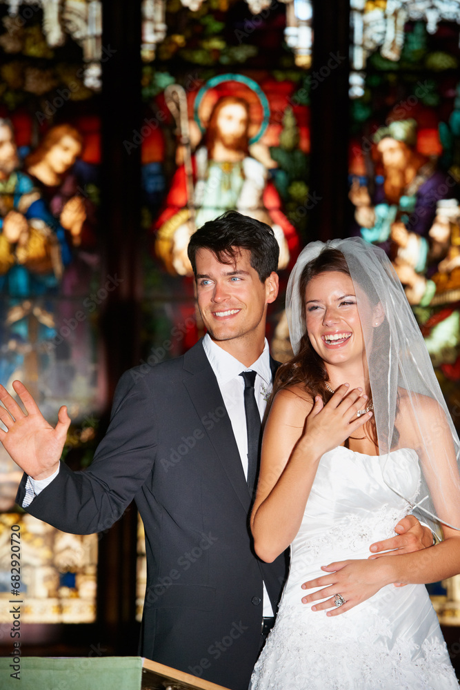 Couple, face and happy in church for wedding, ceremony or event with commitment, wave and union. Marriage, man and woman with smile, joy and love for celebration, loyalty and trust with suit or dress Couple, face and happy in church for wedding, ceremony or event with commitment, wave and union. Marriage, man and woman with smile, joy and love for celebration, loyalty and trust with suit or dress