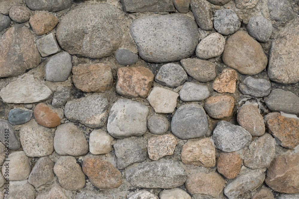Stones cobblestones cement wall solid texture background rough street Stones cobblestones cement wall solid texture background rough street