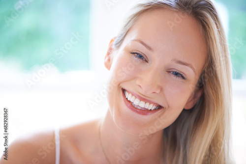 Morning, closeup and portrait of woman in home, apartment or beauty in house. Happy, face and person smile with freedom to relax in living room with joy from skincare, dermatology or cosmetics