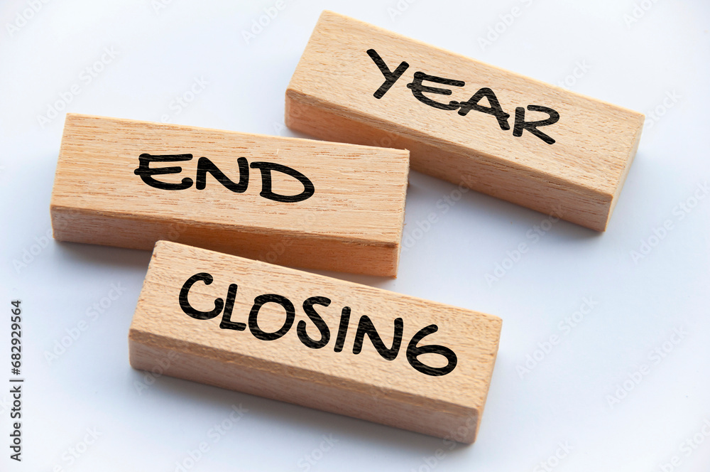 Top view of Year End Closing text on wooden blocks. Top view of Year End Closing text on wooden blocks.
