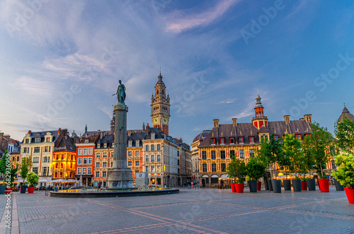 La Grand Place square in Lille city center, historical monument Flemish mannerist style buildings, Column of Goddess, Vieille Bourse in the evening, French Flanders, Nord department, Northern France photo