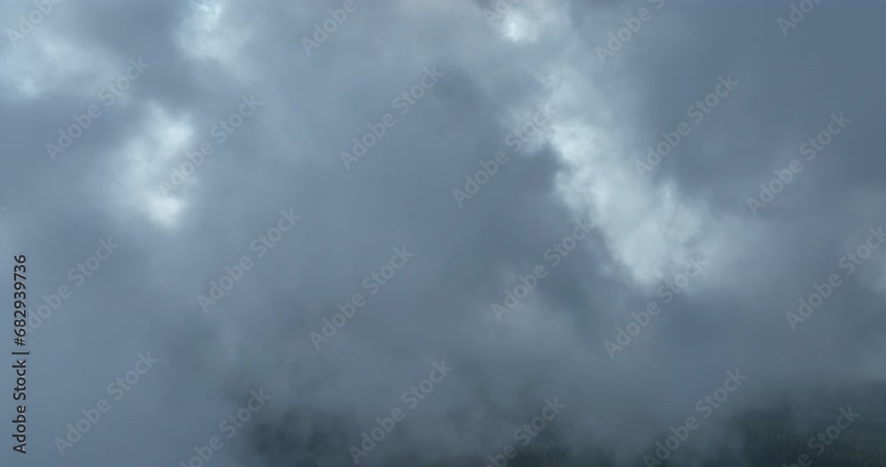 Drone flight above clouds during a misty sunrise morning Drone flight above clouds during a misty sunrise morning