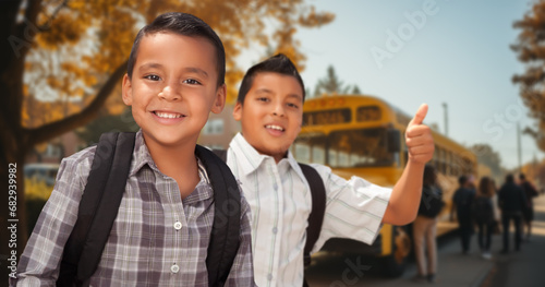 Two Happy Young Hispanic Bo...