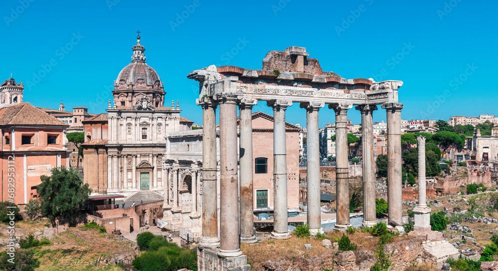 Panorama of roman forum the heart of roman empire. From the Campidoglio they can be seen the Arch of Severus, the temples Saturn and Vesta, Basilica of Maxentius, Arch of Titus, Colosseum Rome, Italy.