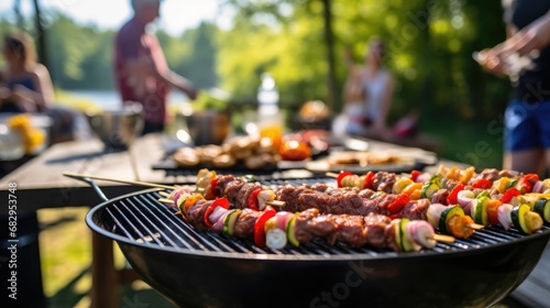 Delicious skewers and burgers cooking on an outdoor grill with a family sitting at a picnic table in the background, enjoying a summer barbecue. Ai generated