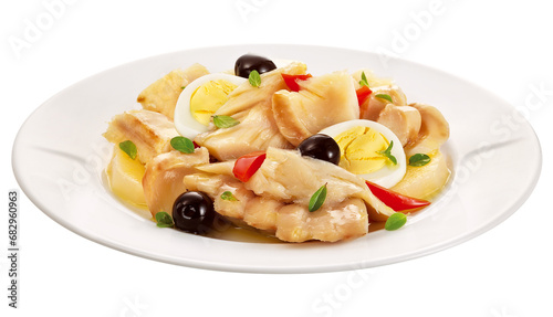 prato com receita de bacalhau com ovo cozido, azeitonas pretas e pimentão isolado em fundo transparente - bacalhoada  photo