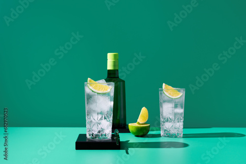 Elegant gin tonic setup with fresh lime slices photo