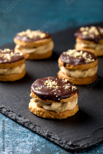 Round nut cookies with coffee and nut cream