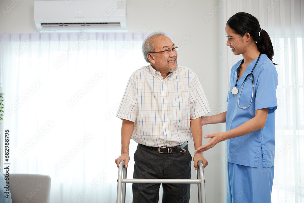 nurse or caregiver helping senior man walking with a walker and support him at home nurse or caregiver helping senior man walking with a walker and support him at home