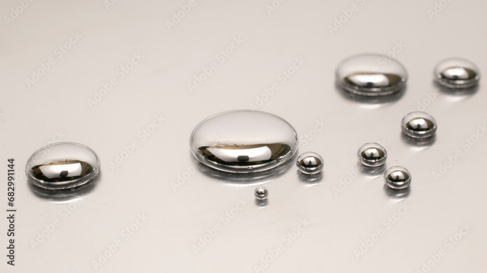 mercury toxic metal, spilled drops of mercury mercury toxic metal, spilled drops of mercury