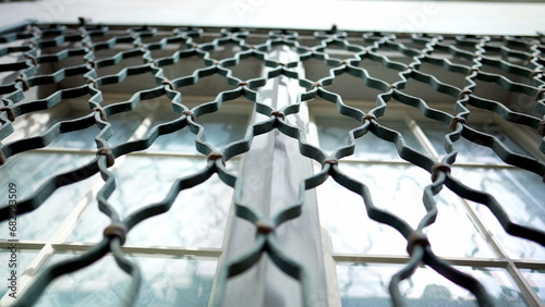 Canvastavla Metal window fence protection patterns demarcating property separation in buildi