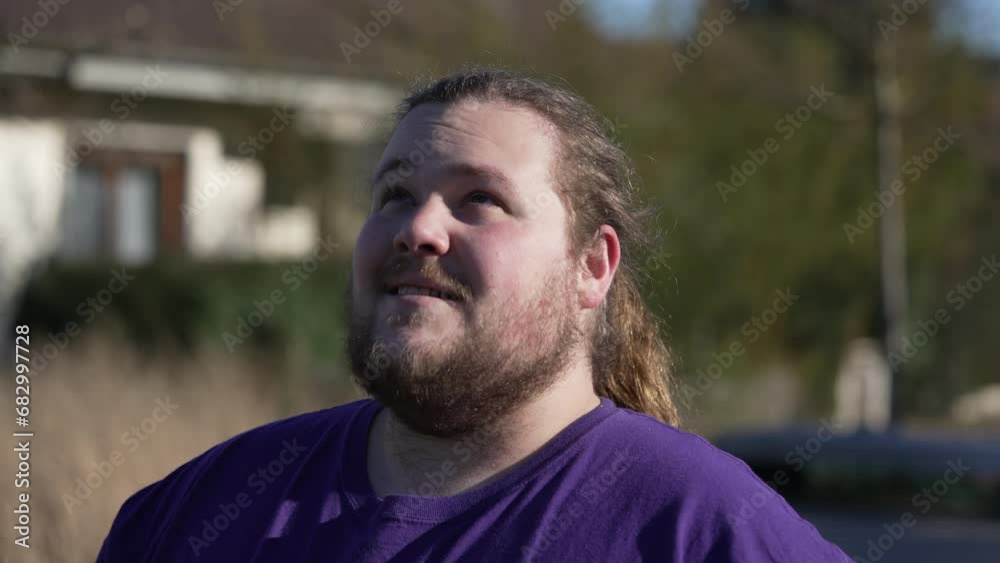 One religious young man close up face raising head to sky smiling with HOPE. Faithful person feeling gratitude One religious young man close up face raising head to sky smiling with HOPE. Faithful person feeling gratitude