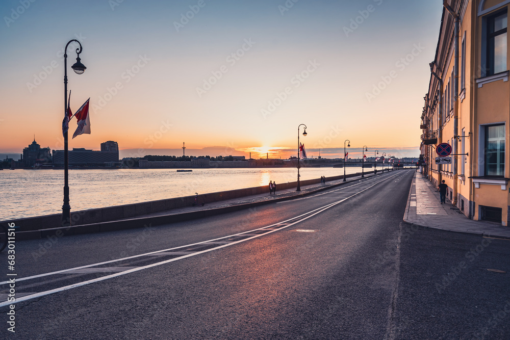 Sunrise over Neva river on Palace embankment. Early morning in Saint-Petersburg. Russia