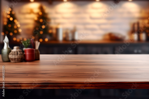 Brown wooden table with space for your text, set against a blurred background of a kitchen interior. Bright image.