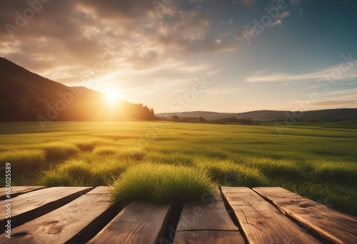 Wooden planks and sunset over grass field landscape background High quality photo
