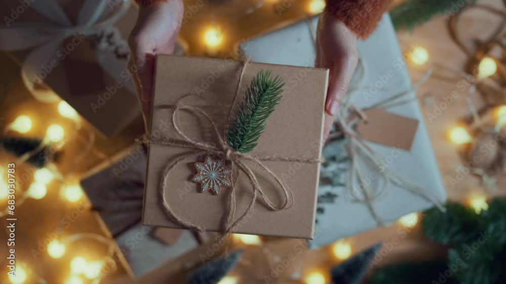Hands of woman gives a Christmas gift box, Congrats, Happy New Year, Merry Christmas, presents gifts Hands of woman gives a Christmas gift box, Congrats, Happy New Year, Merry Christmas, presents gifts