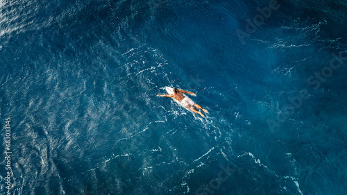 Surfer in Deep Ocean Hawaii