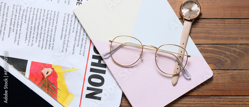 Newspaper with eyeglasses, ...