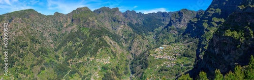 locality of Curral das Freiras inserted in the lower part of a grandiose valley seen from above through the eira do cerrado viewpoint on the island of Madeira. photo