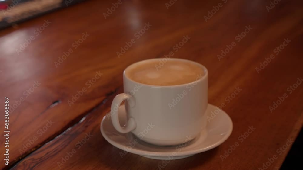 Fresh white mug of morning Coffee Close Up on a bar counter. Slow Motion. Cup of Aromatic Coffee Fresh white mug of morning Coffee Close Up on a bar counter. Slow Motion. Cup of Aromatic Coffee