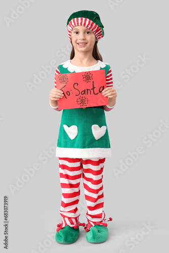 Happy young girl in elf cos...