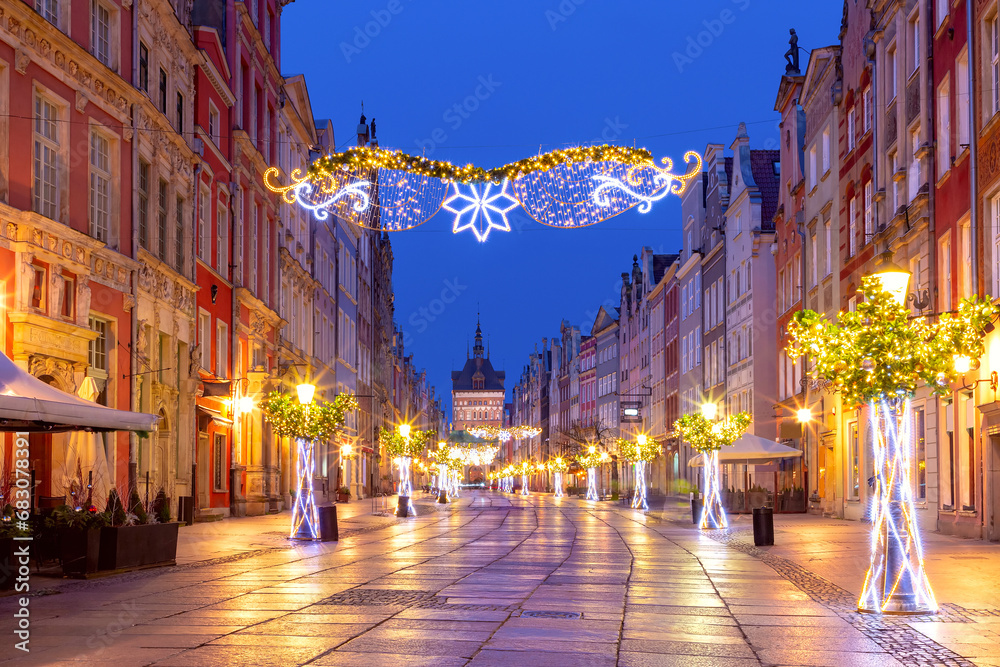 Golden gate of Long market decorated with Christmas illuminations at night, Gdansk, Poland. Golden gate of Long market decorated with Christmas illuminations at night, Gdansk, Poland.