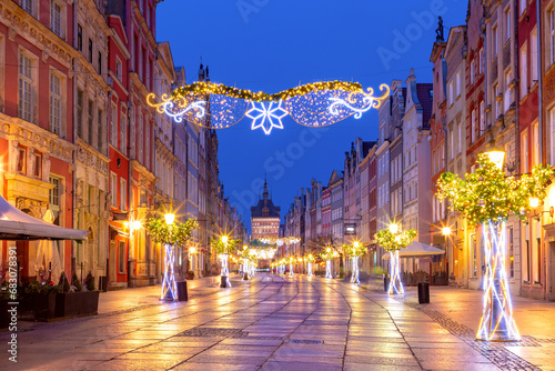 Golden gate of Long market decorated with Christmas illuminations at night, Gdansk, Poland.