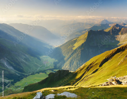Green mountain valley during sunrise; view from peaks of hintertux photo