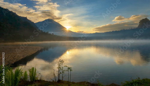 nature landscape; a beautiful sunrise over a mountain lake with
