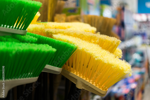 Large assortment of brushes for cleaning premises in the store. Trade in floor cleaning equipment