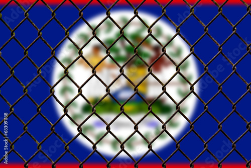 A steel mesh against the background of the flag Belize.