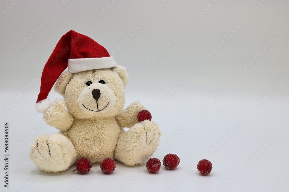 Christmas card with teddy bear with Christmas hat and red balls Christmas card with teddy bear with Christmas hat and red balls