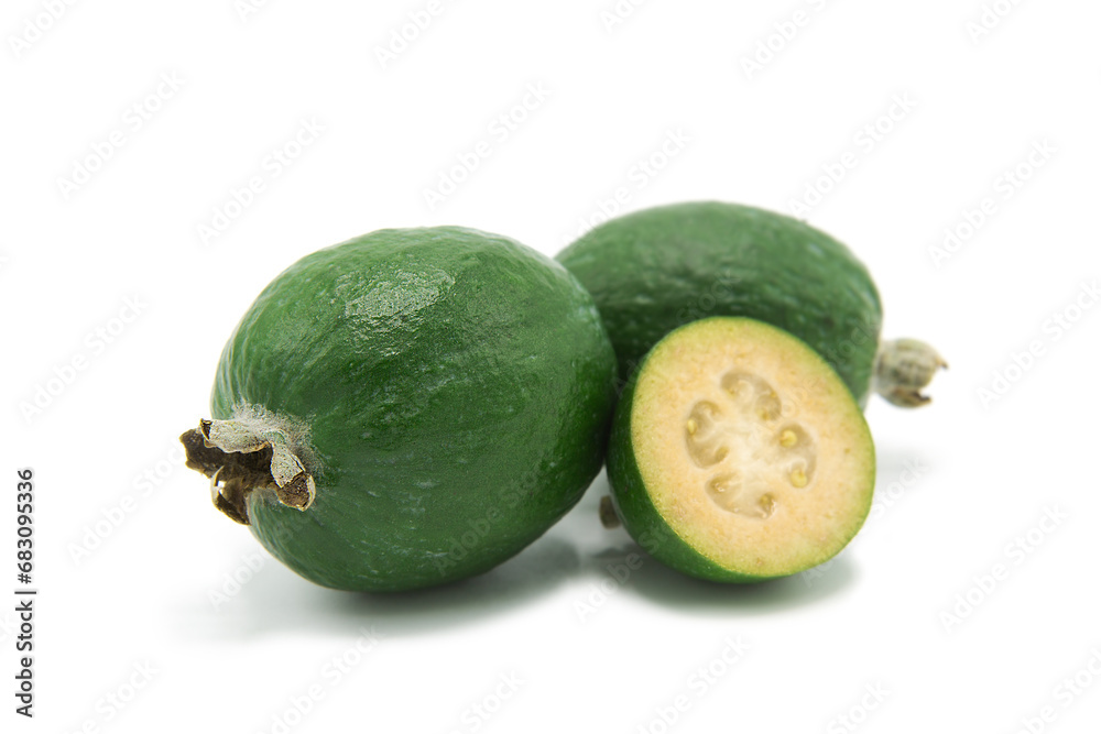 Fresh ripe feijoa whole and half isolated on white background. Fresh ripe feijoa whole and half isolated on white background.