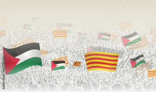 Palestine and Catalonia flags in a crowd of cheering people.