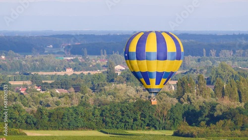 Pommard, Burgundy, France - August 8, 2021: Hot air balloon ride above the Burgundy landscape. Cote de Beaune, Pommard region.