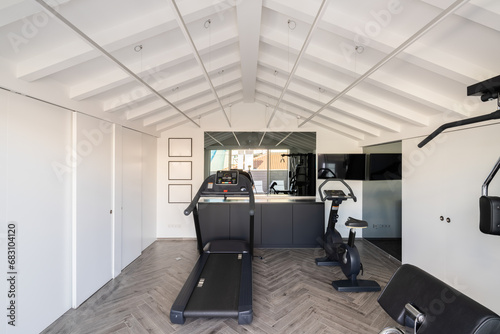 Home gym with exercise equipment photo