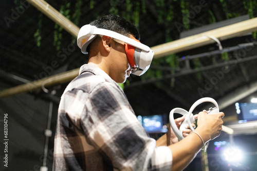 Man engaging with virtual reality game at an event photo